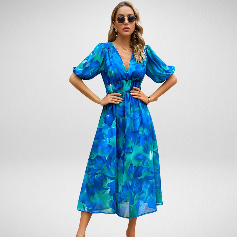 Chique midi jurk met geometrisch patroon en korte mouwen in lanternstijl