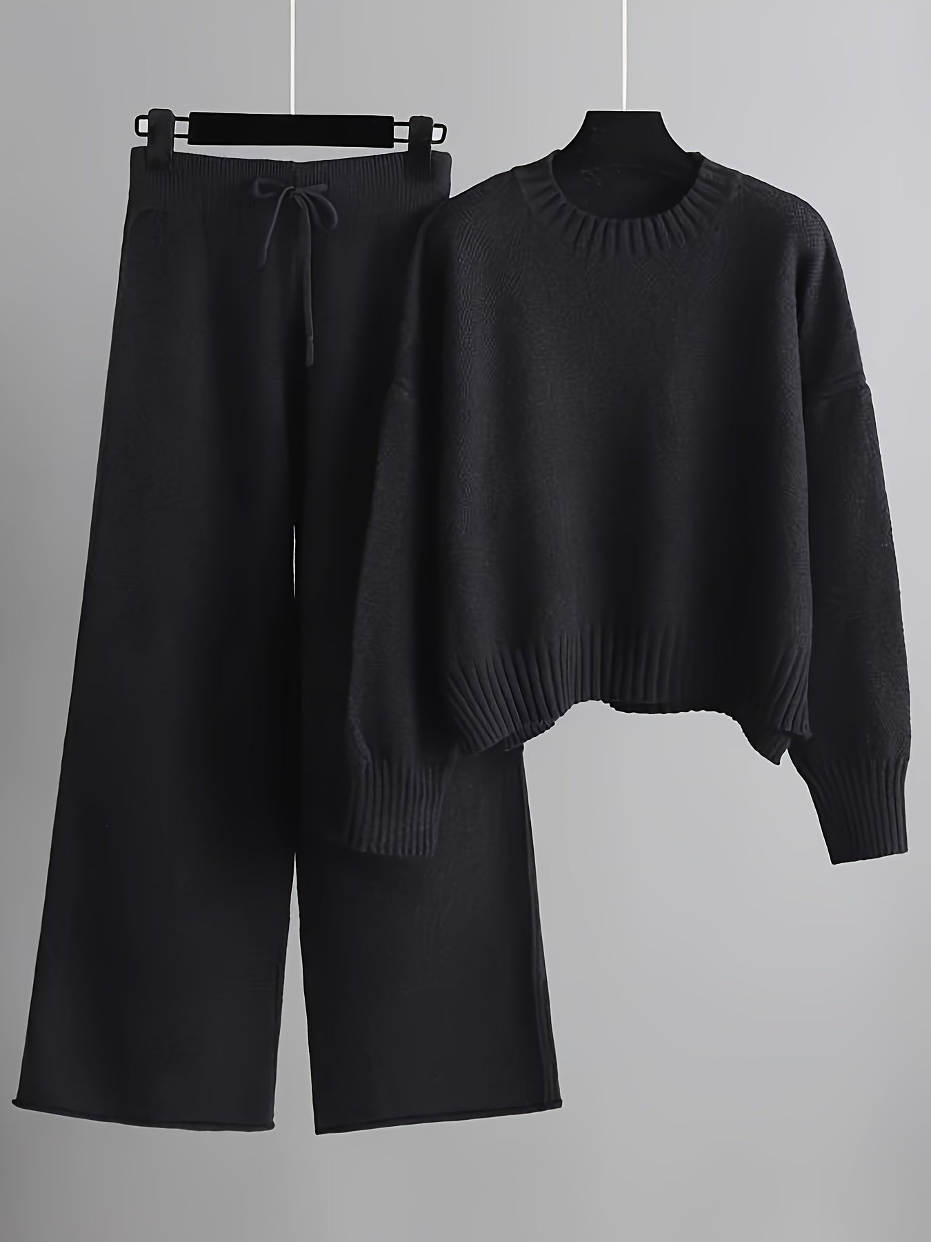 Modieuze dames outfit met sweater en wijde broek