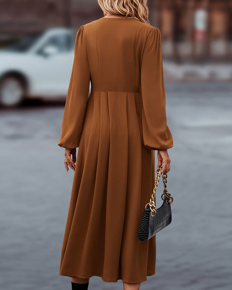 Stijlvolle herfst midi-jurk met lange mouwen en knoopdetails
