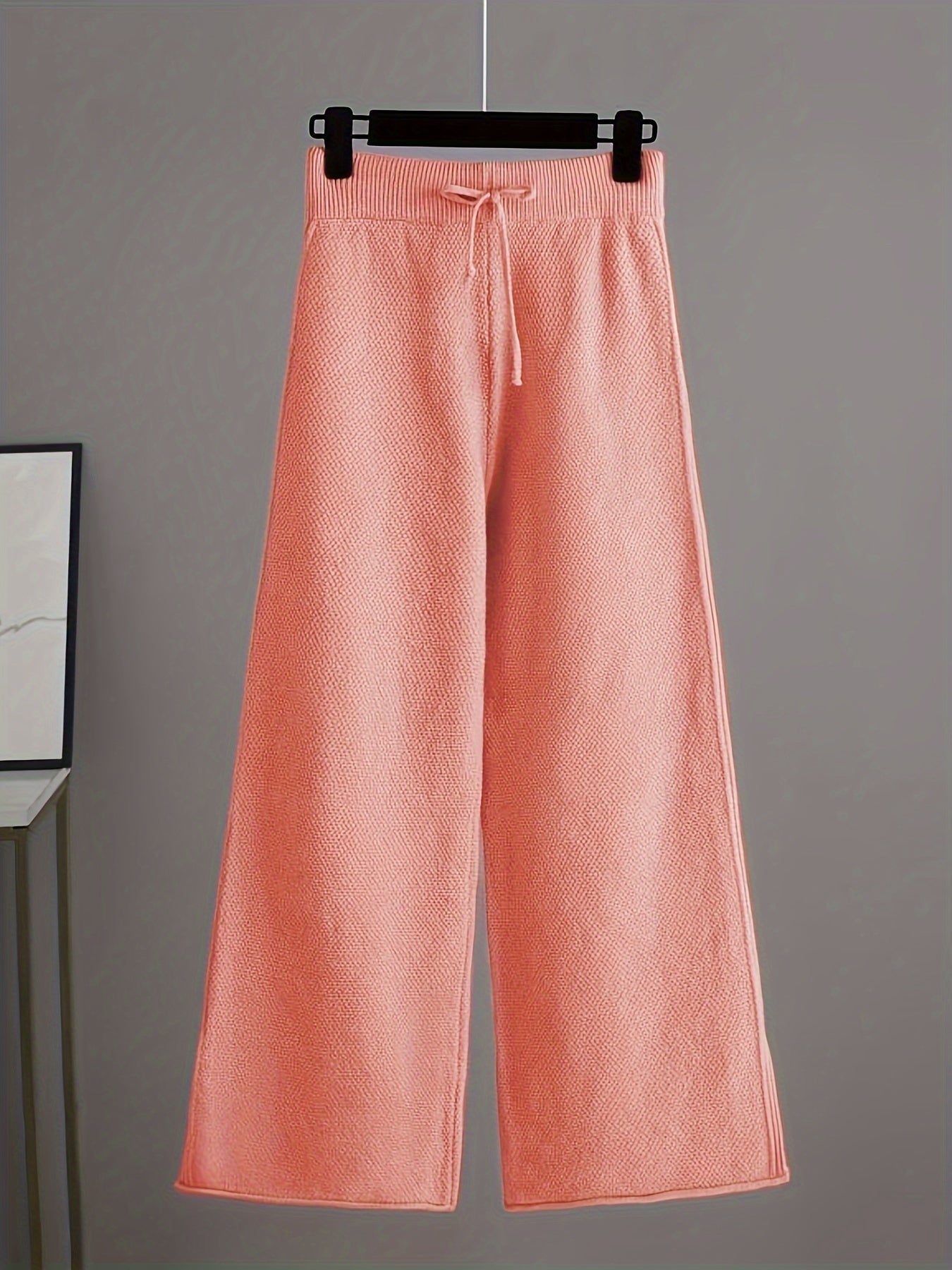 Modieuze dames outfit met sweater en wijde broek