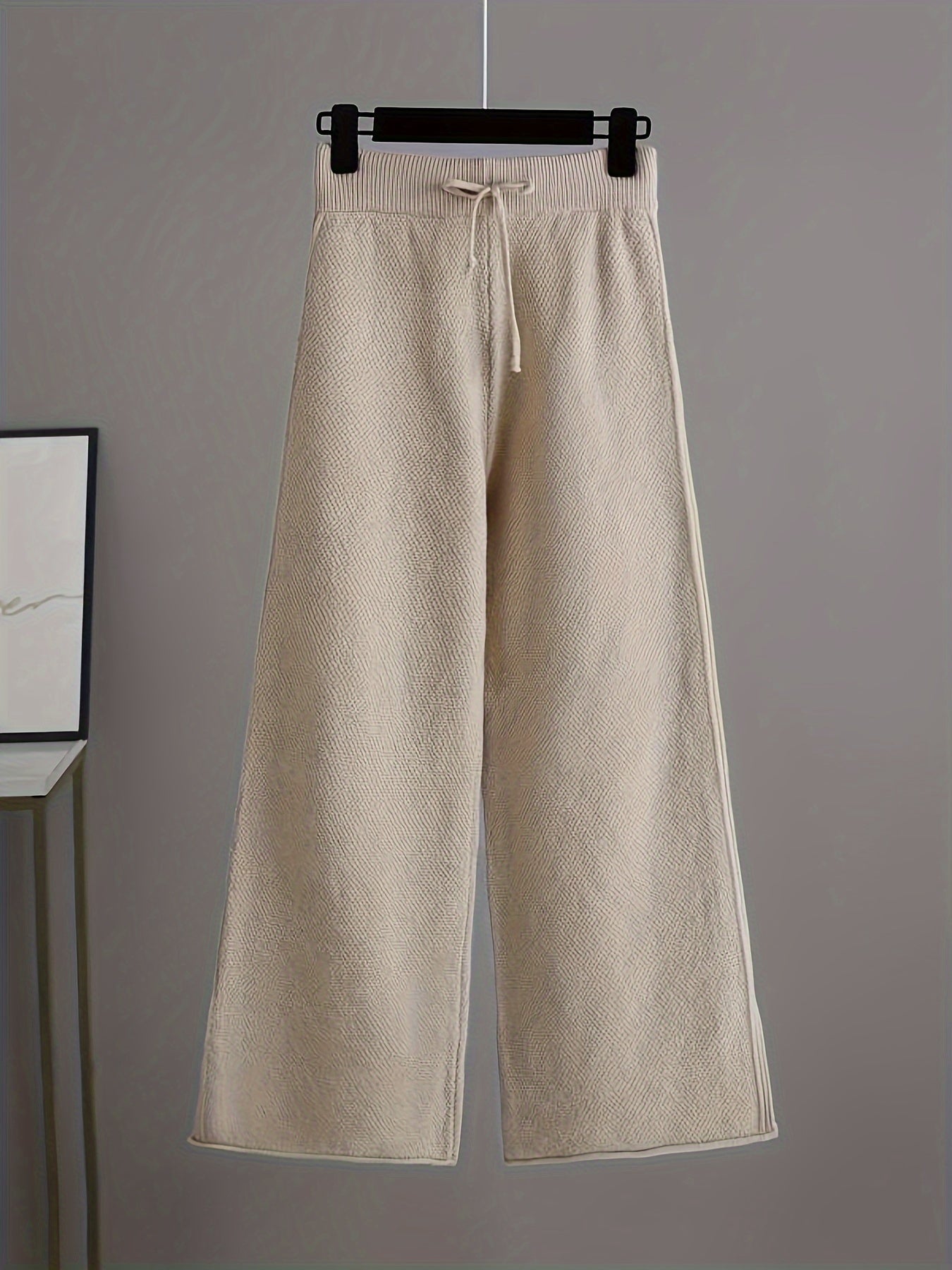 Modieuze dames outfit met sweater en wijde broek