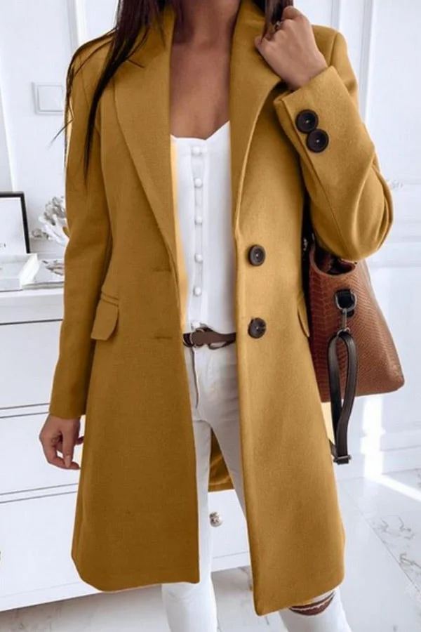 Een elegante damesjas met een rechte snit en een verfijnde kraag voor een stijlvolle uitstraling.