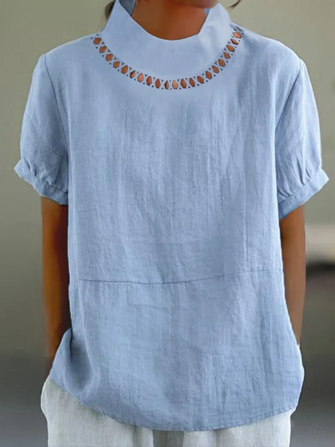 Minimalistische top met origineel patroon bij de hals