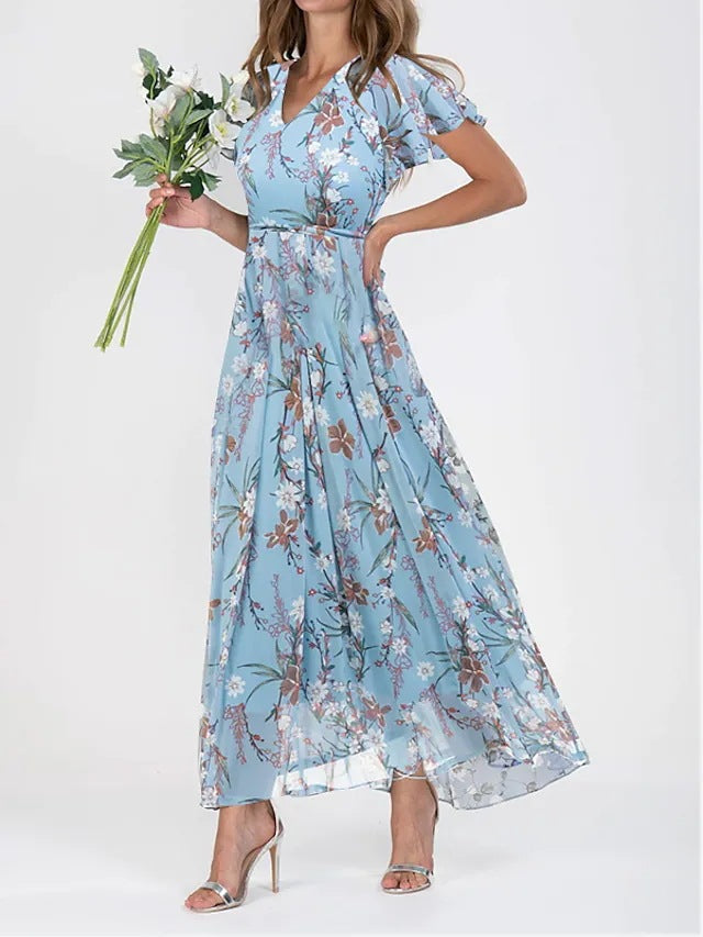Elegante en luchtige zomerjurk met bloemenpatroon, perfect voor dagelijks gebruik en speciale momenten