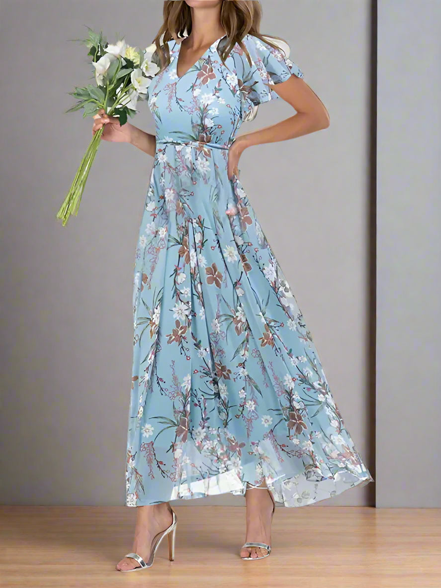 Elegante en luchtige zomerjurk met bloemenpatroon, perfect voor dagelijks gebruik en speciale momenten