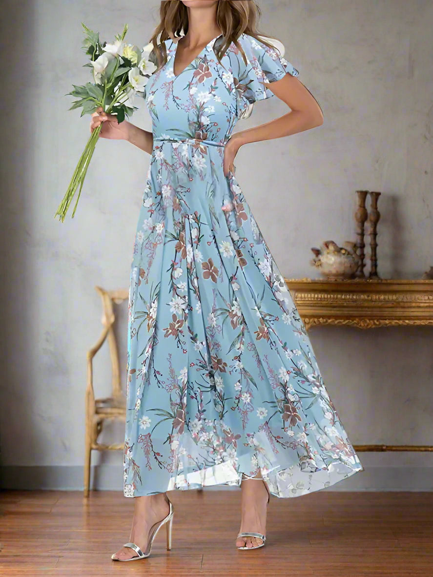 Elegante en luchtige zomerjurk met bloemenpatroon, perfect voor dagelijks gebruik en speciale momenten