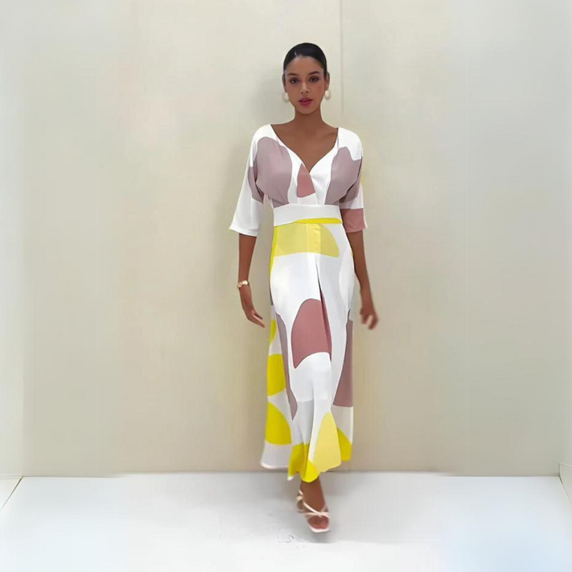 Trendy lange zomerjurk met speelse halslijn en driekwart mouwen
