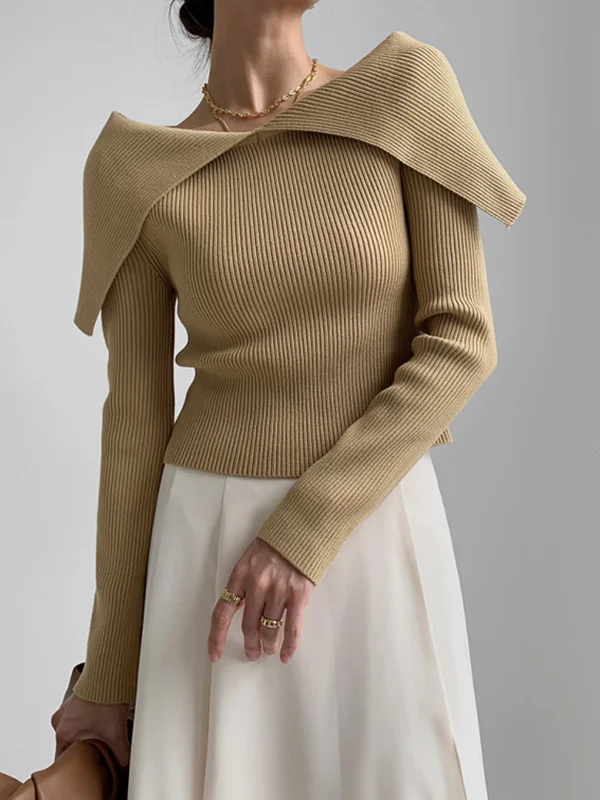 Elegante trui met diepe V-hals en lange mouwen, getailleerd, effen kleur