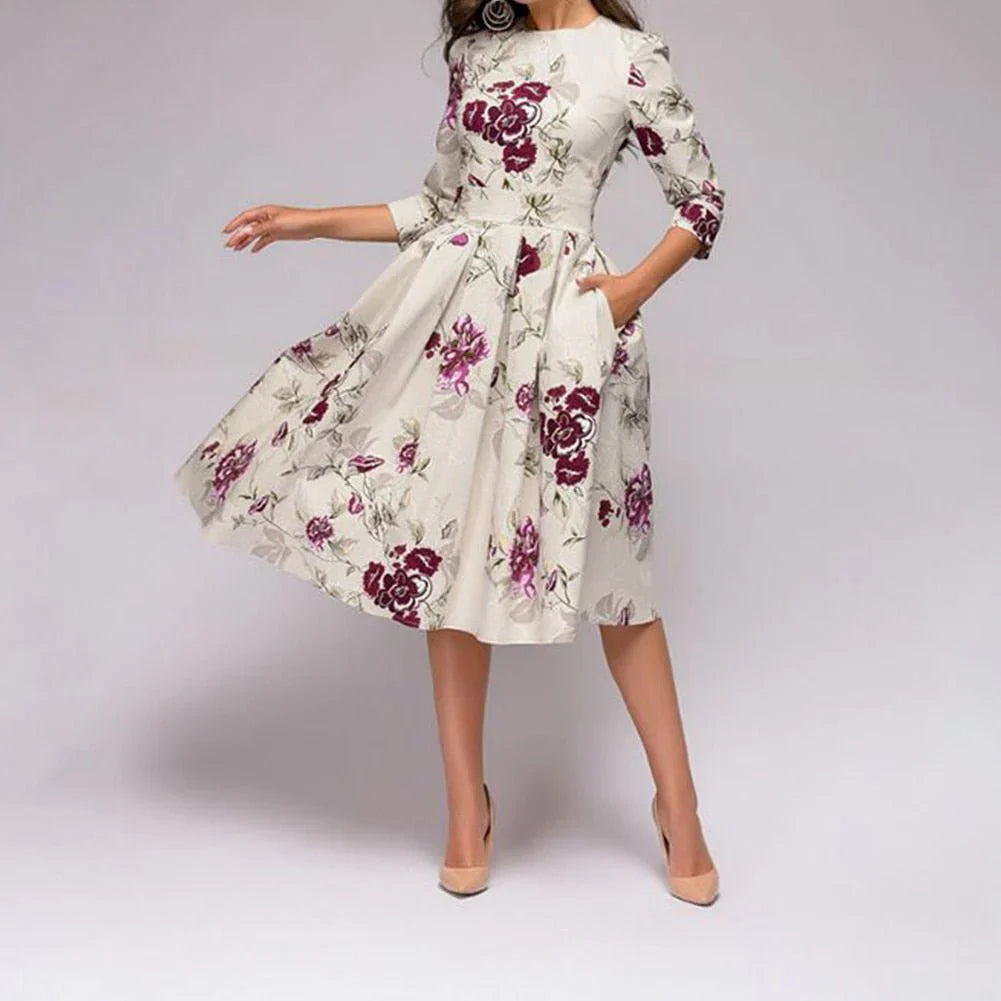 Trendy midi-jurk met wijd uitlopende rok en bloemenprint voor een vrouwelijke look