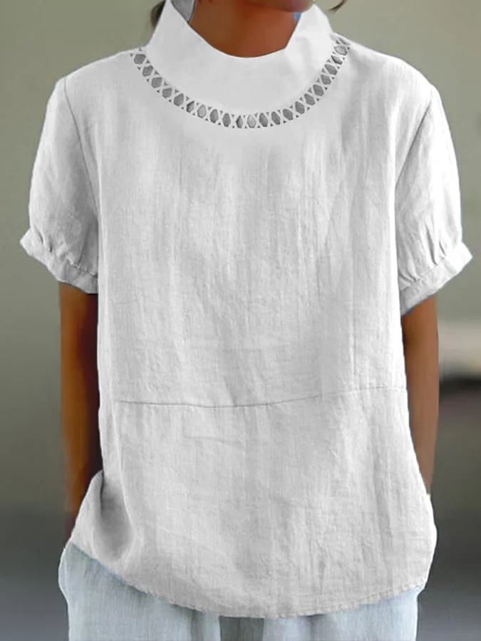 Minimalistische top met origineel patroon bij de hals