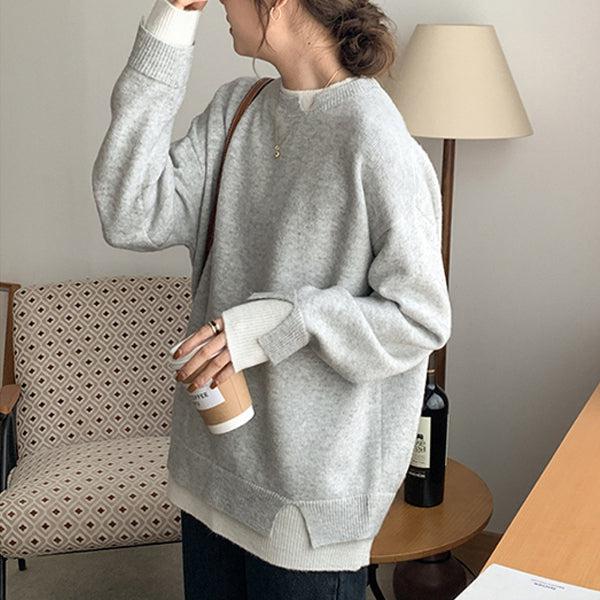 Elegante oversized trui met lange mouwen en geometrische uitsparing