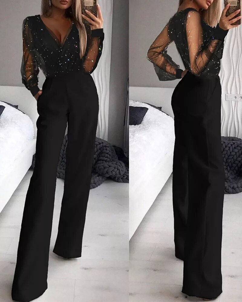 Modieuze dames jumpsuit met flared broek en sprankelende blouse