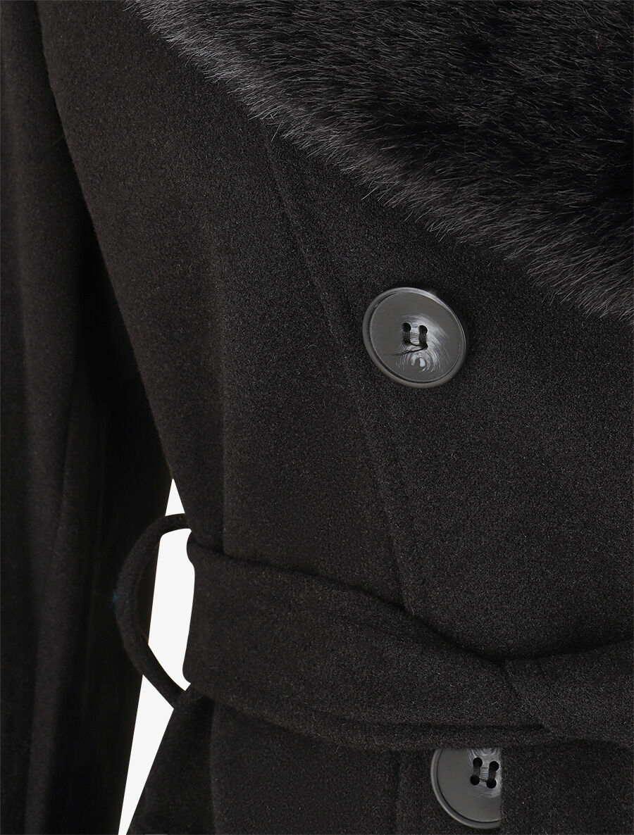 Elegante damesjas in monochroom ontwerp met unieke kraag