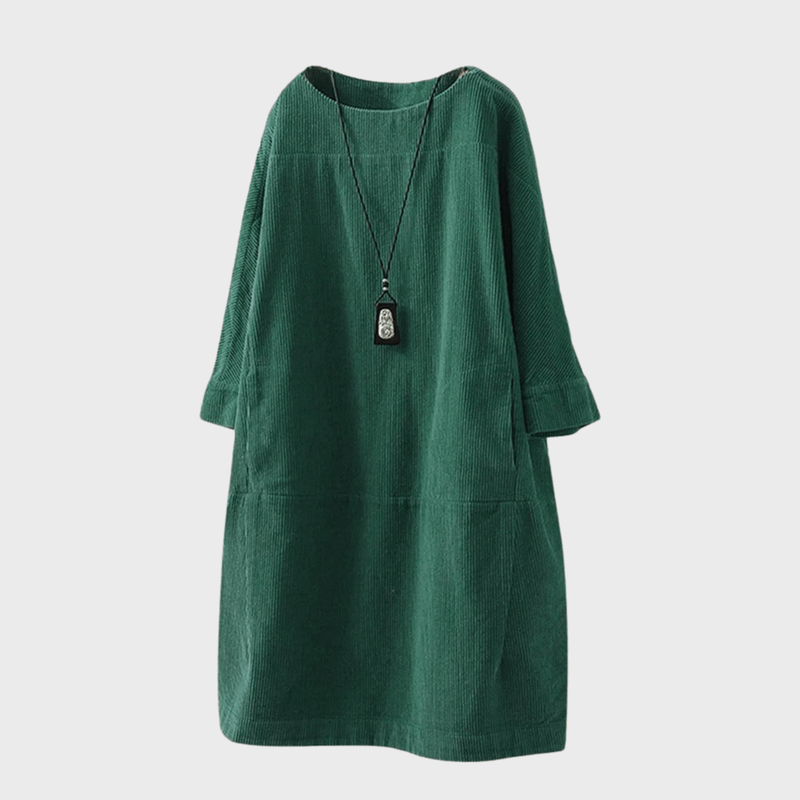 Modieuze losse damesjurk met klassieke vintage details