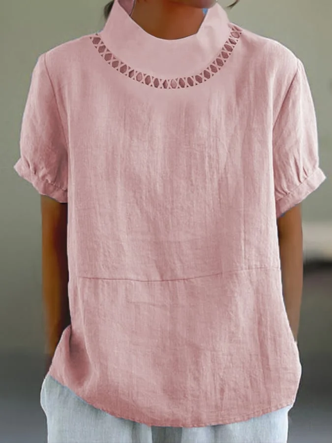 Minimalistische top met origineel patroon bij de hals
