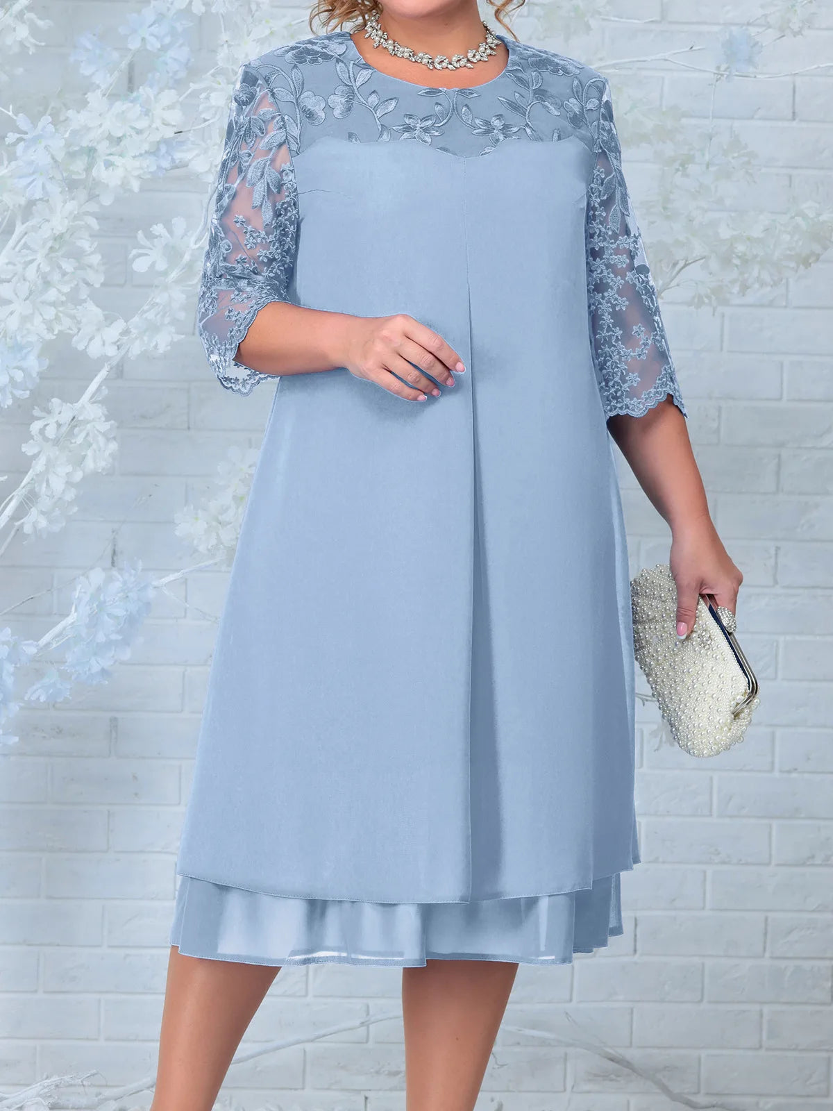 Chique banketjurk met stijlvolle elementen in grote maten voor een elegante look