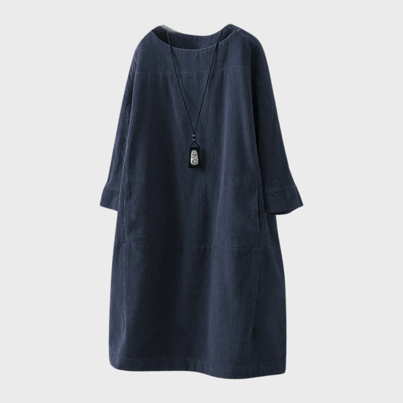 Modieuze losse damesjurk met klassieke vintage details