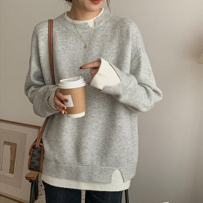 Elegante oversized trui met lange mouwen en geometrische uitsparing