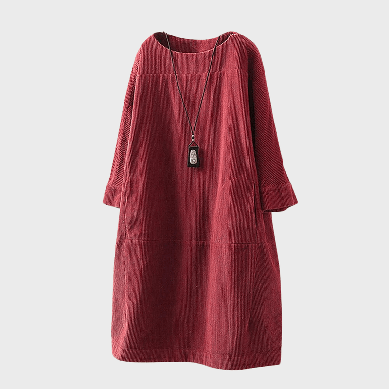 Modieuze losse damesjurk met klassieke vintage details