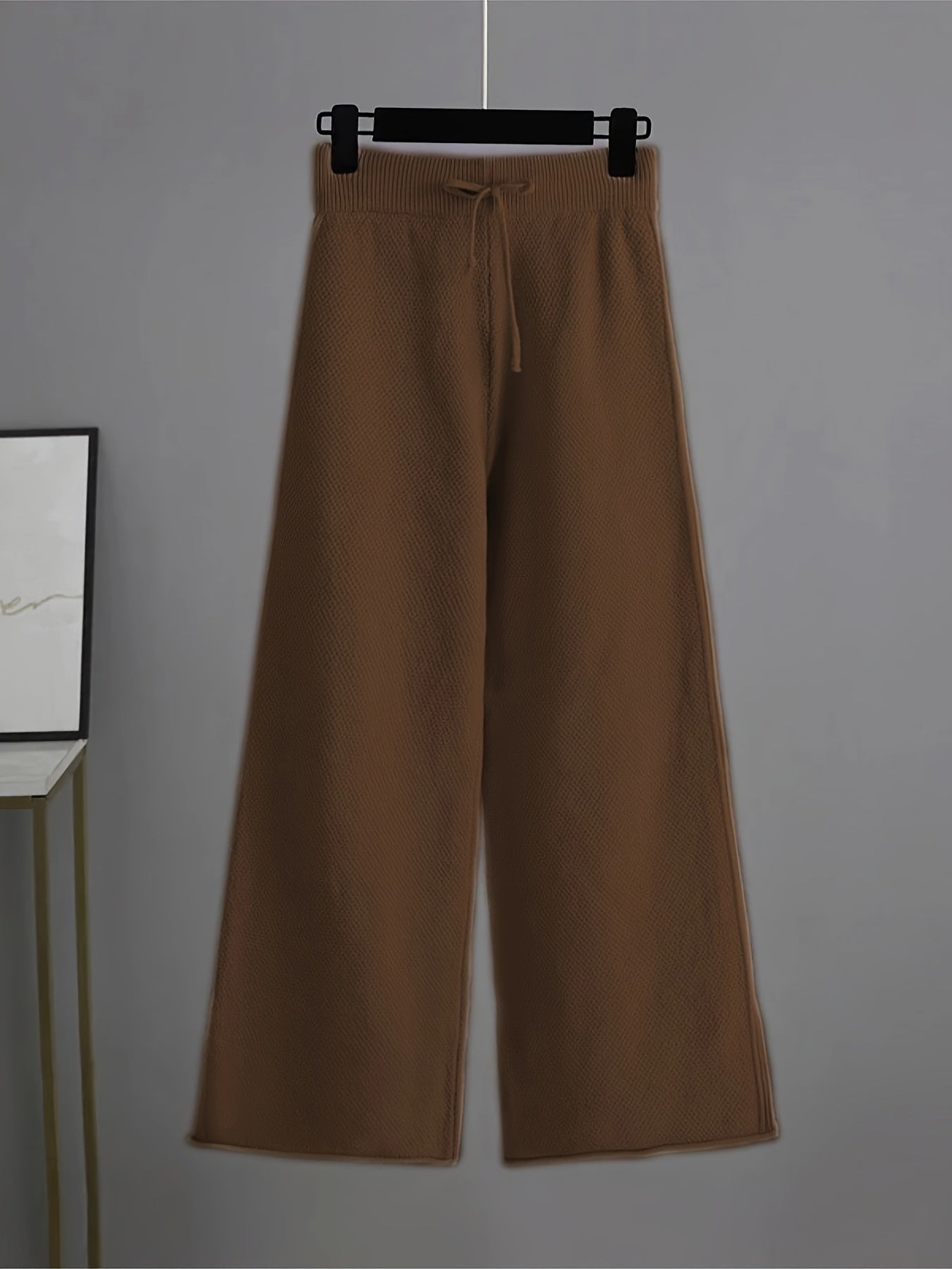 Modieuze dames outfit met sweater en wijde broek