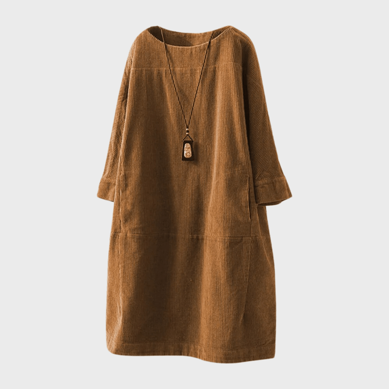 Modieuze losse damesjurk met klassieke vintage details
