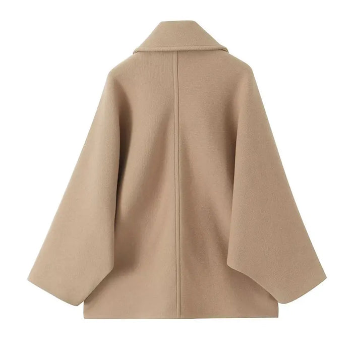Trendy korte jas voor dames met een ruim model, knoopsluiting en revers