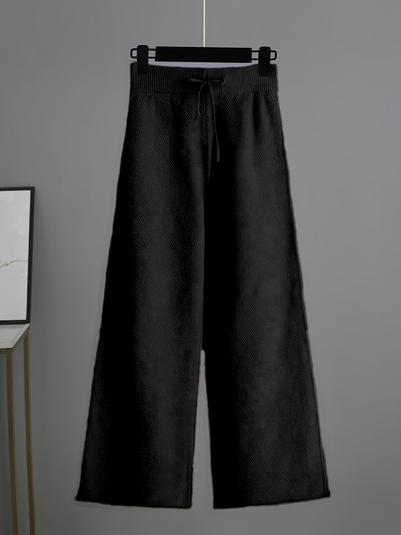 Modieuze dames outfit met sweater en wijde broek