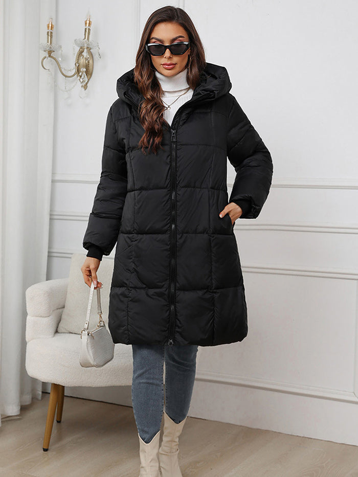 Lange dames winterjas met praktische capuchon