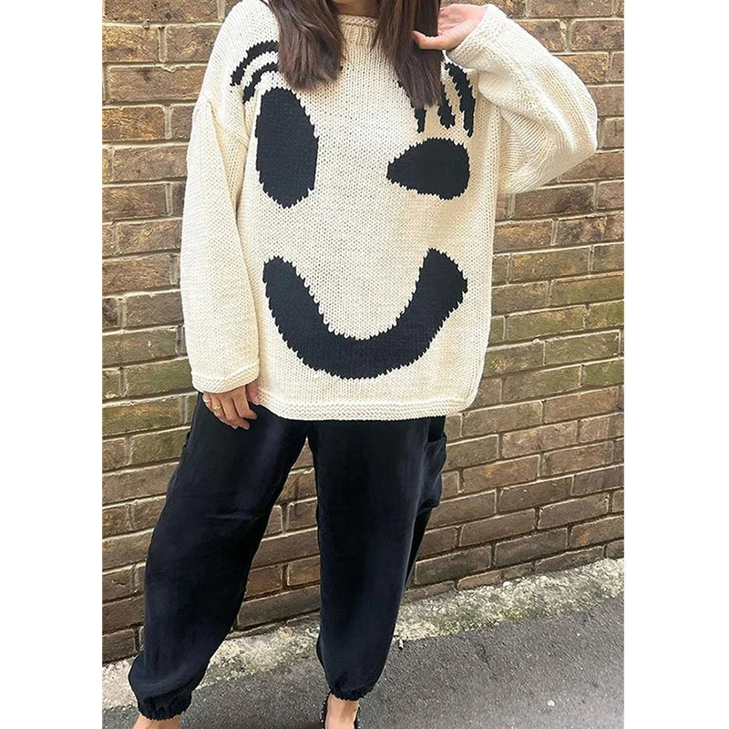 Stijlvolle dames trui met lachend gezicht ontwerp – Perfect voor een casual look