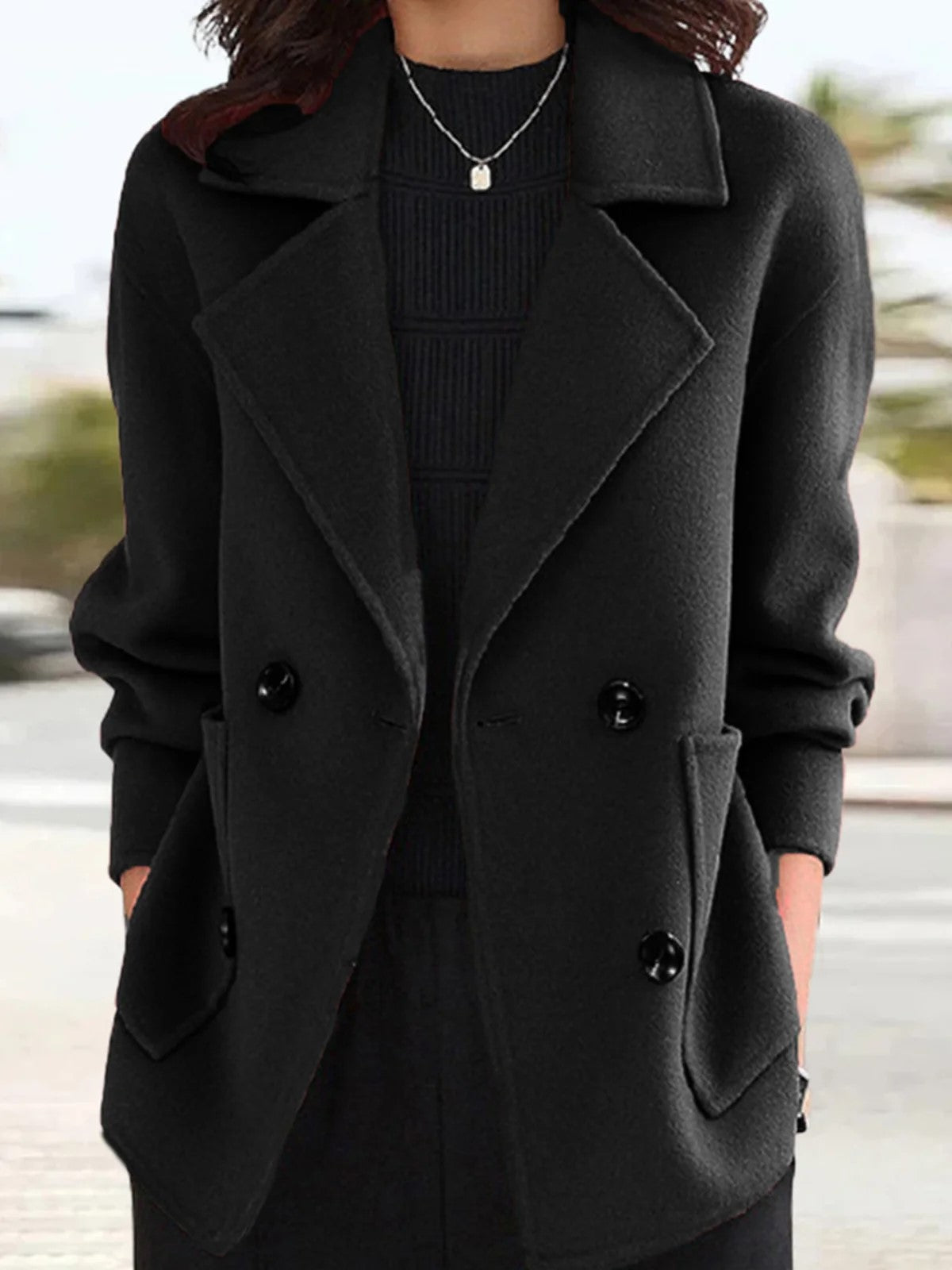 hippe blazer met minimalistische kraag, knopen en zakken