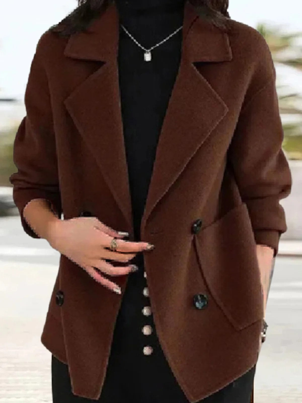 hippe blazer met minimalistische kraag, knopen en zakken