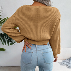 Beige top met vlechtwerk en lange mouwen